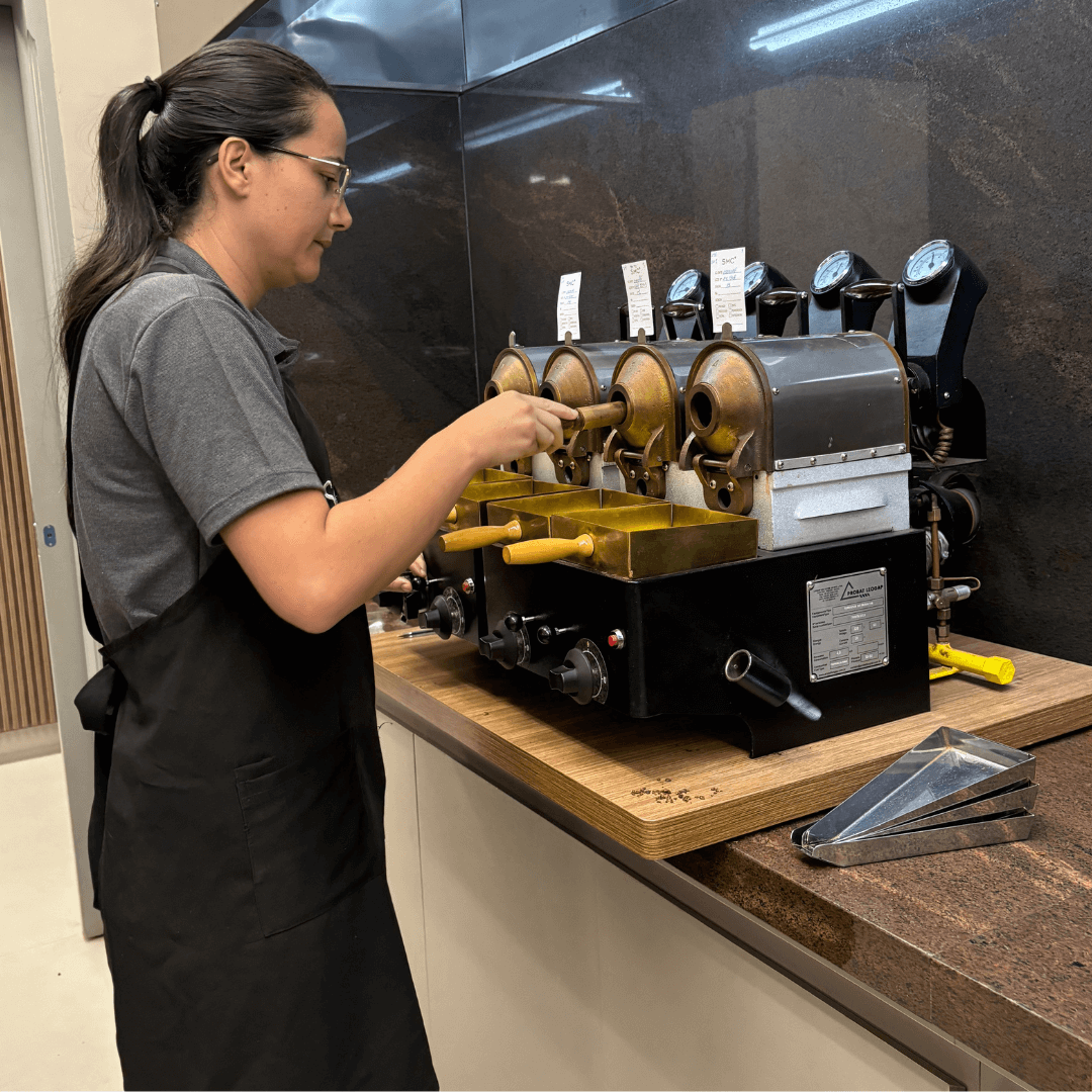 Roaster checking samples at SMC Headquarters