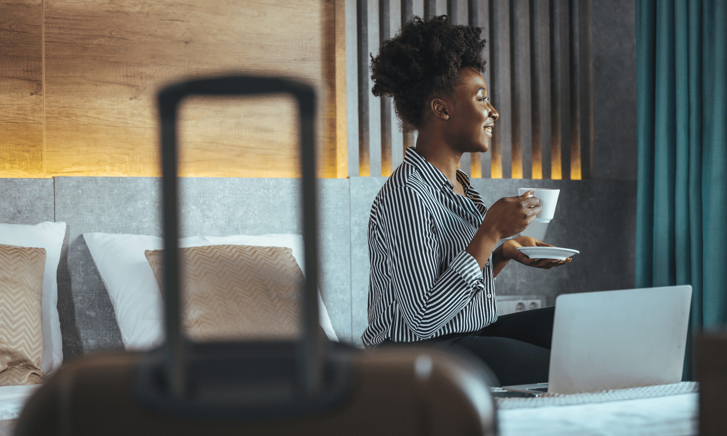 Woman drinking coffee in a hotel