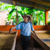 Colombia Farmer with his producer on drying beds